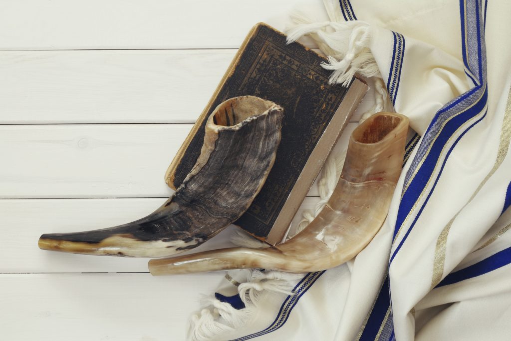 Prayer Shawl - Tallit and Shofar (horn) jewish religious symbol.