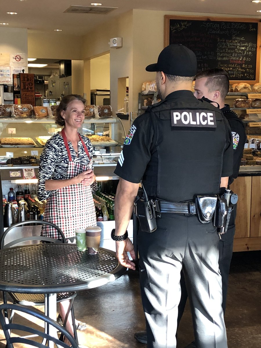 Residents Join Police to Celebrate National Coffee With a Cop Day