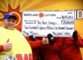 The "Three Amigos" collect their cash prize in this photo from 2012. | Maryland Lottery