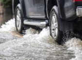 Feature flash flood watch heavy rain  pickup-truck-on-a-flooded-street-picture-id1011442792