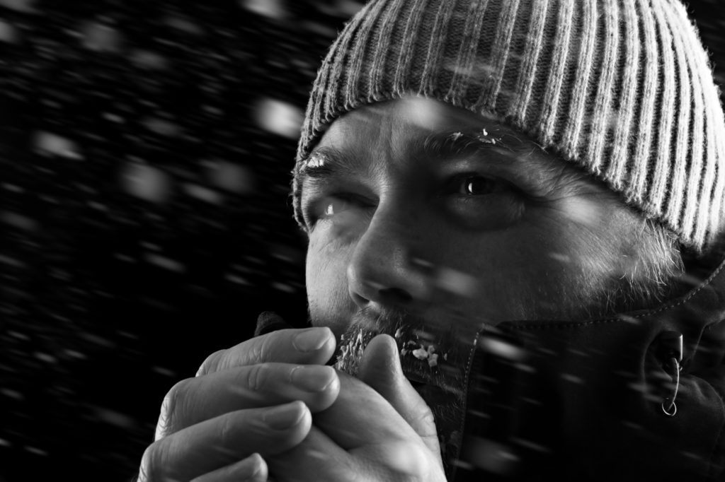 man-freezing-in-snow-storm-bw-montgomery-community-media